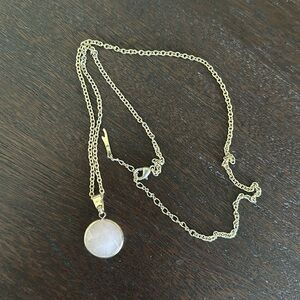 Light pink necklace.